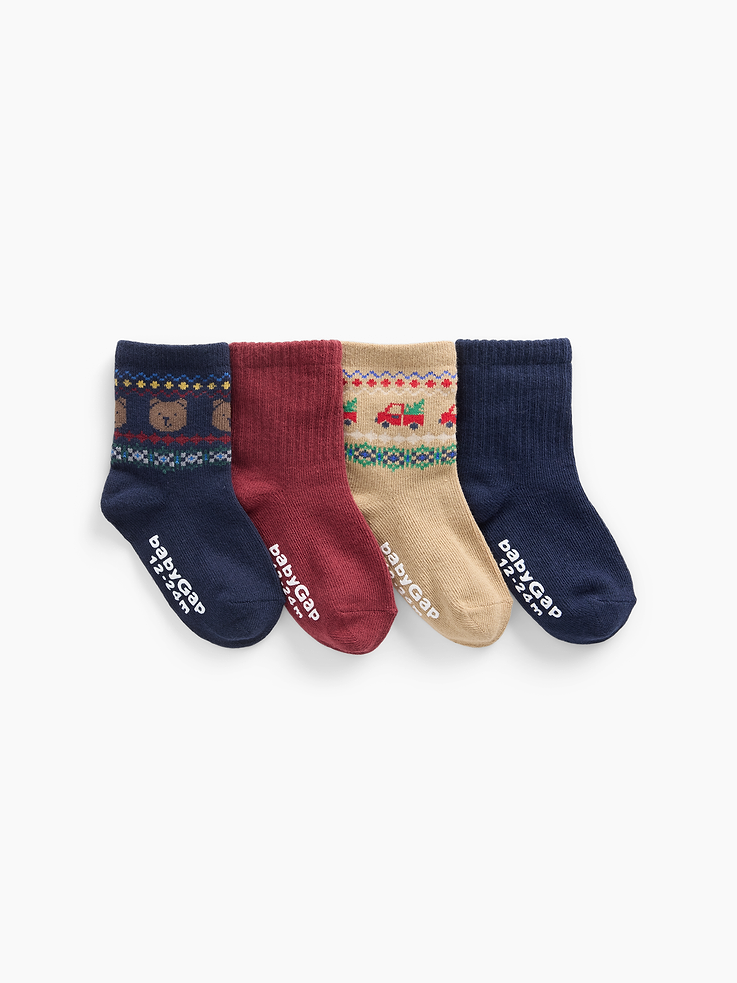 Image 1 of 2, Soft, stretch knit crew socks., Ribbed top., Reinforced toe and heel., This product was made in a factory that invests in gender equity and women’s empowerment through RISE. Learn more at gapinc.com/equity ., Product #1185872