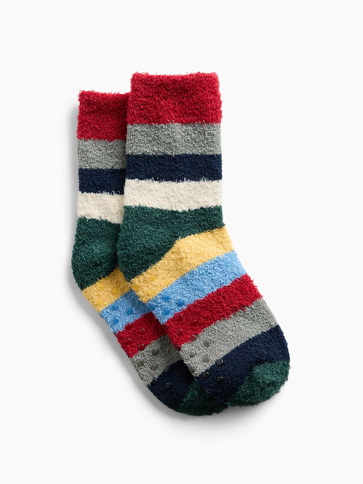 Image 1 of 2, Soft, stretch cozy knit crew socks., Reinforced toe and heel., Gripper dots at sole., Allover Happy Stripe., This product was made in a factory that invests in gender equity and women’s empowerment through RISE. Learn more at gapinc.com/equity ., Product #1185931