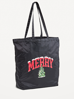 Image 1 of 1, Merry & Exclusive, Carry a little holiday spirit wherever you go. This festive tote features our iconic MERRY graphic and holiday tree, inspired by Old Navy’s beloved festive graphic tees., Graphic at front., Makes errands much merrier., Product #916681