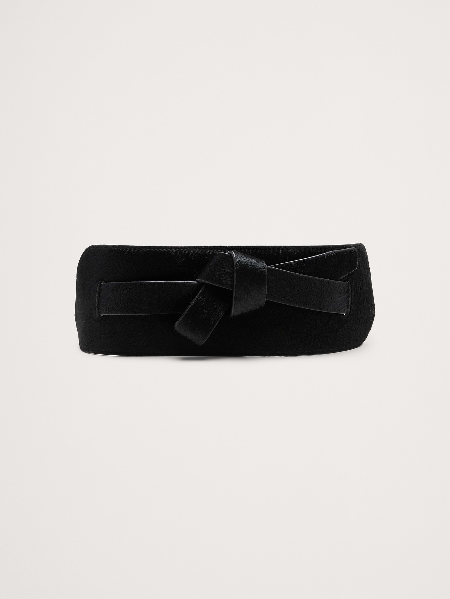 Image 1 of 3, Designed to accentuate the waist, this leather corset belt has a buckle closure at back for ease and comfort., Product #915201