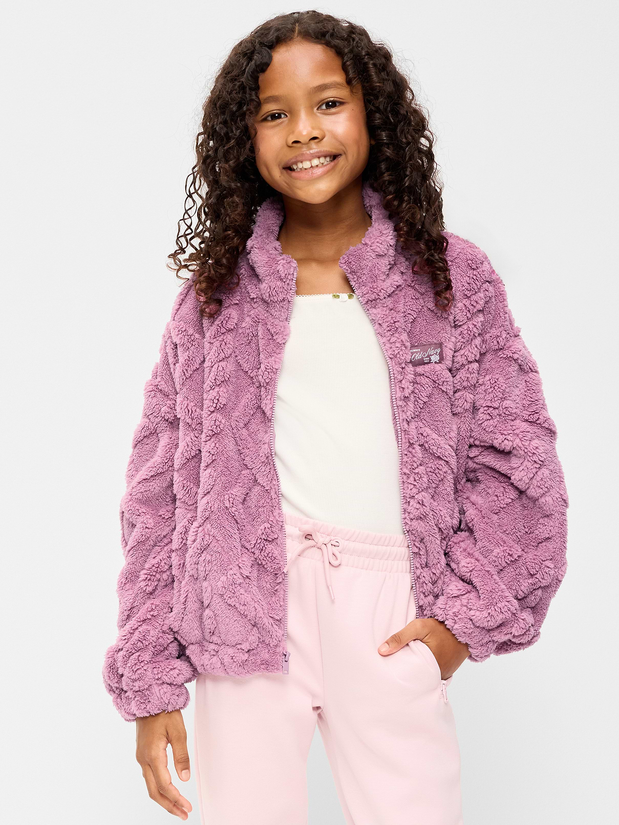 Image 1 of 2, mock neck, long sleeves, drop shoulders, logo graphic, full length zipper, hand-warming pockets, cinched hem, Product #908619
