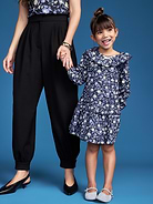 Image 1 of 4, ruffled neckline, long sleeves hit just above the wrist, drop waist, ruffled tiered hem, Product #1184461