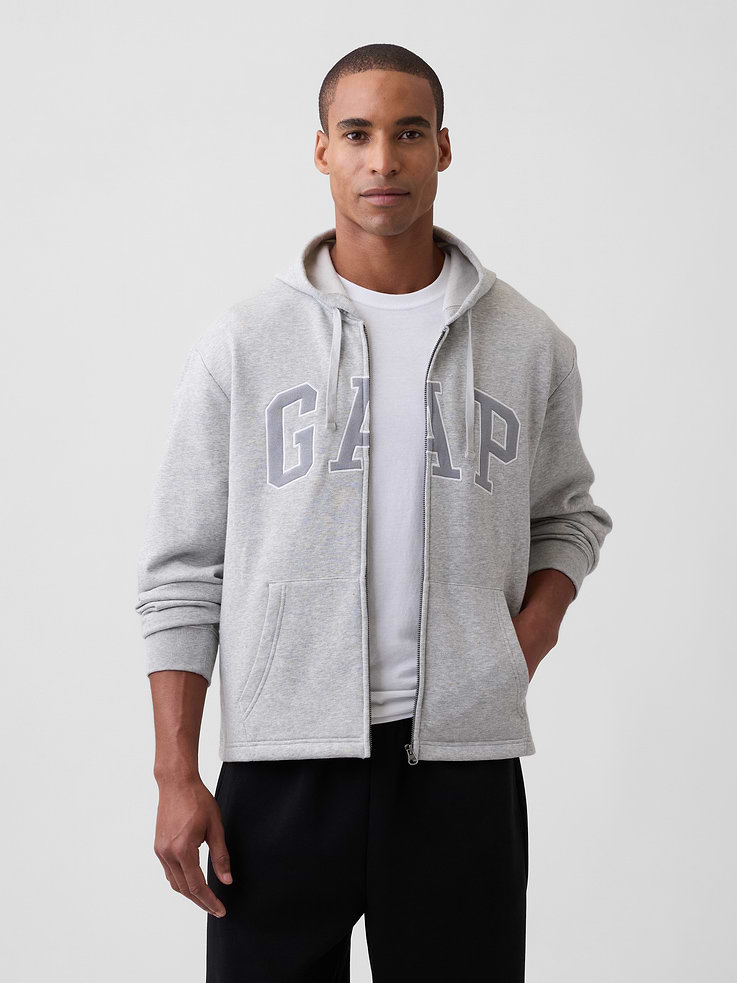Image 1 of 4, This product is made with/contains 23% recycled polyester. Compared to virgin materials, using recycled materials helps reduce resource use and waste., Soft, comfy fleece., Dropped shoulder, long sleeves with banded cuffs., Drawcord ties at hood, zip front., Gap logo at front., Kanga pockets., Product #1188934