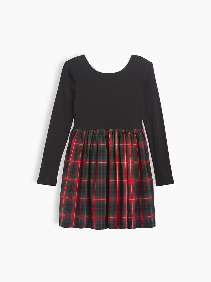 Image 1 of 3, Soft ribbed top, smooth woven skirt., Long sleeves., Round neckline., Shirring at waist., Select styles have allover print or plaid at skirt., This product was made in a factory that invests in gender equity and women’s empowerment through RISE. Learn more at, Product #1187025