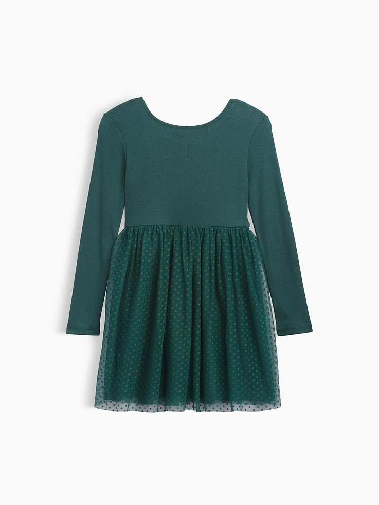 Image 1 of 3, Soft ribbed top, smooth woven skirt., Long sleeves., Round neckline., Shirring at waist., Select styles have allover print or plaid at skirt., This product was made in a factory that invests in gender equity and women’s empowerment through RISE. Learn more at, Product #1187025