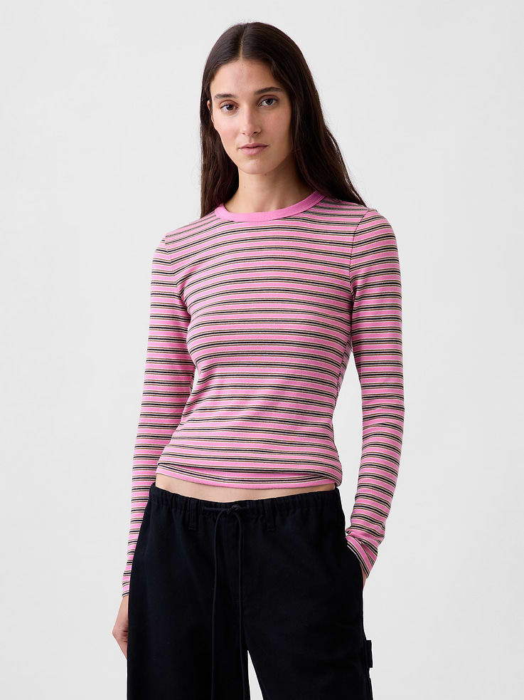 Image 1 of 4, Our soft & stretchy cotton-modal blend that hugs you just right. It’s your new 7-days-a-week essential., Soft, stretch cotton-modal blend T-Shirt in a slightly cropped length., Crewneck., Long sleeves., This product was made in a factory that invests in gender equity and women’s empowerment through RISE. Learn more at gapinc.com/equity ., Product #801470