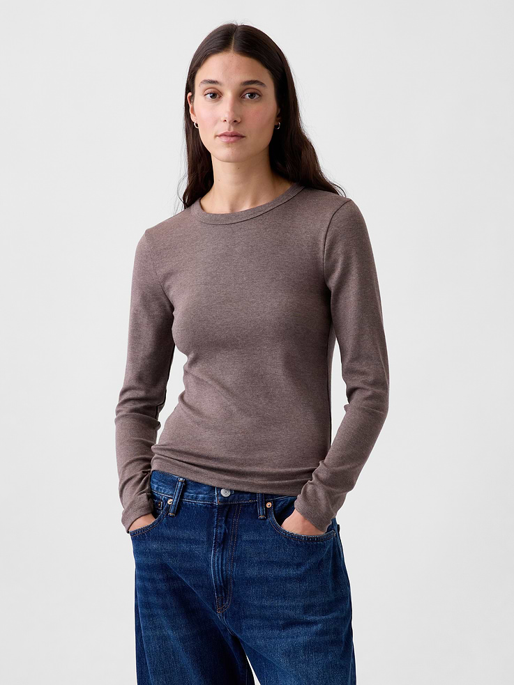 Image 1 of 5, Our soft & stretchy cotton-modal blend that hugs you just right. It’s your new 7-days-a-week essential., Soft, stretch cotton-modal blend T-Shirt in a slightly cropped length., Crewneck., Long sleeves., This product was made in a factory that invests in gender equity and women’s empowerment through RISE. Learn more at gapinc.com/equity ., Product #801470