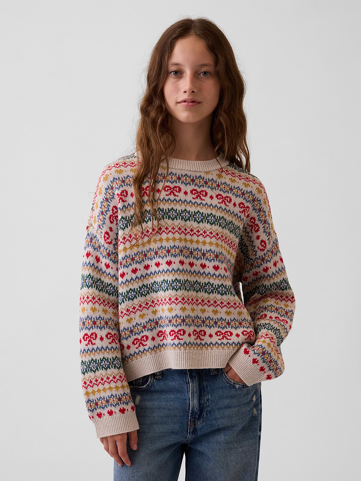 Image 1 of 5, Soft knit cotton sweater. In an oversized fit., Crewneck., Long sleeves with drop shoulders., Ribbed cuffs and hem., Happy Stripe or Fair Isle design., This product was made in a factory that invests in gender equity and women’s empowerment through RISE. Learn more at gapinc.com/equity ., Product #1184838