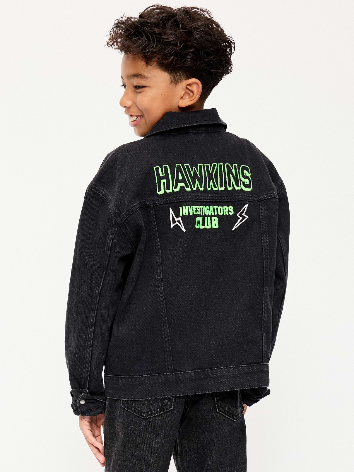 Image 1 of 4, A gender-neutral style for all-day play., spread collar, long sleeves, buttoned cuffs, button-flap pockets at chest, full-length buttoned placket, vertical welt pockets, Stranger Things: Tales From 85™/ © Netflix. Used with permission., Product #1185067