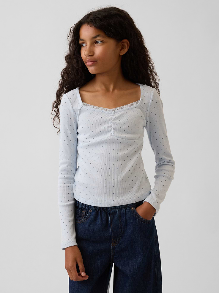 Image 1 of 5, Soft, ribbed cotton T-shirt., Sweetheart neckline with lace trim detail., Long sleeves., Seaming detail at front., This product was made in a factory that invests in gender equity and women’s empowerment through RISE. Learn more at gapinc.com/equity ., Product #1185502