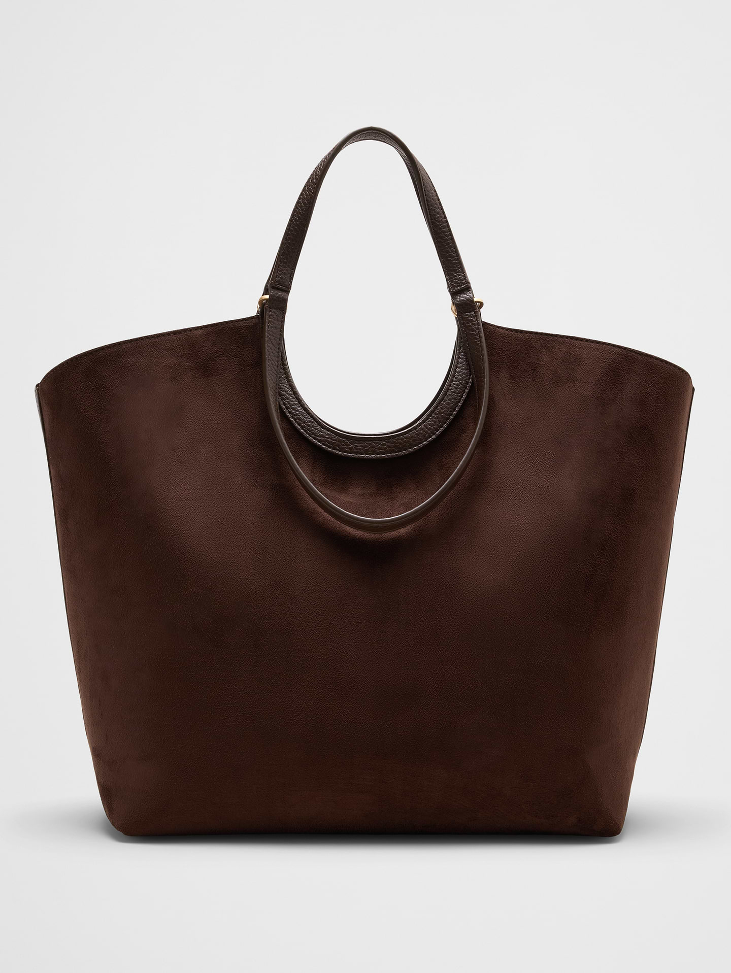 Image 1 of 5, Crafted in smooth vegan leather, this spacious tote is designed to carry everything you need from work to weekend. Featuring double handles and a roomy interior, it combines everyday functionality with a clean, polished look that complements any outfit., VEGAN LEATHER: Soft and smooth, this faux leather looks and feels luxurious., Made exclusively for Banana Republic Factory., Product #1180952