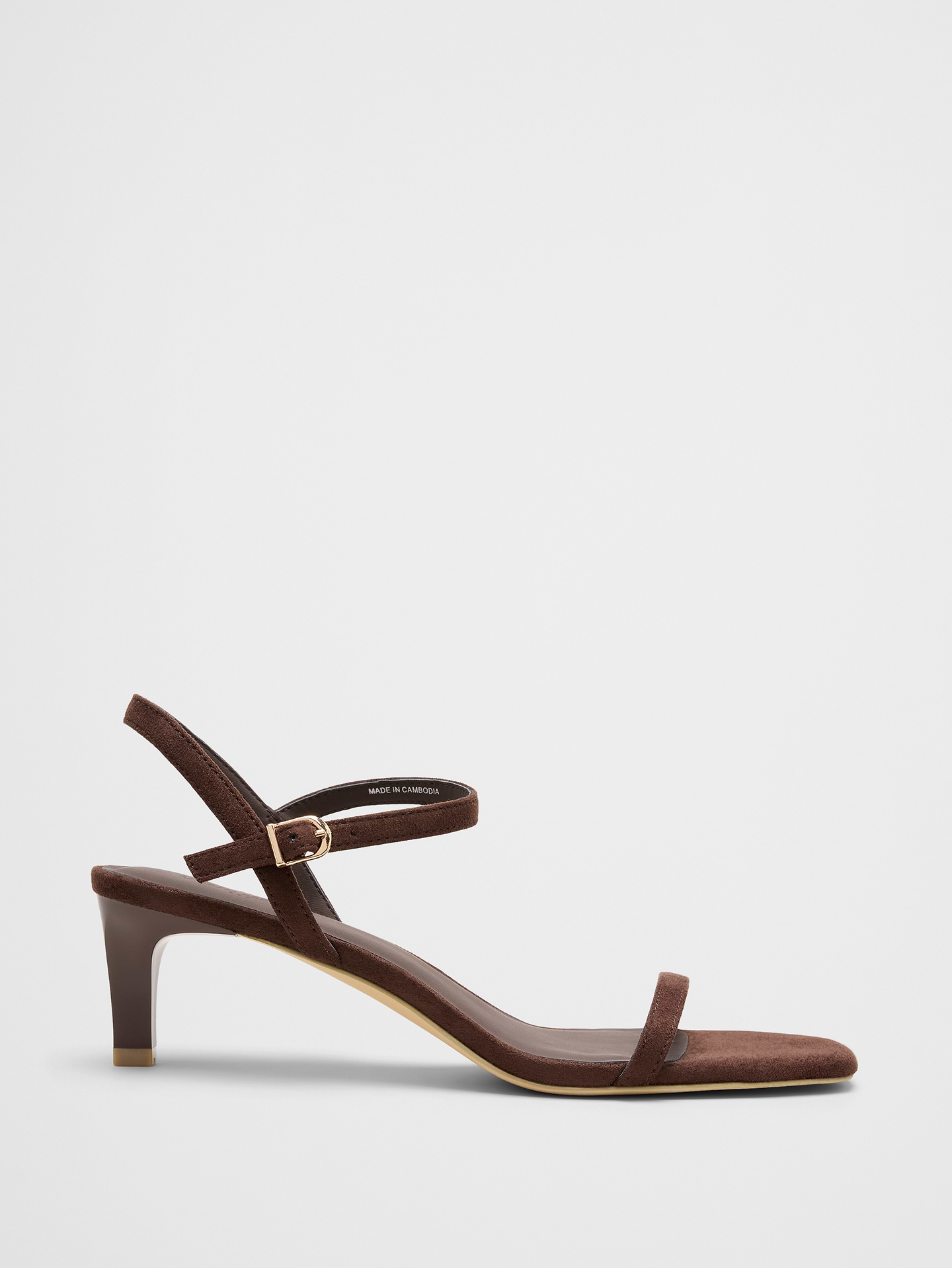 Image 1 of 3, Crafted in smooth vegan leather, this sandal features a walkable two‑inch kitten heel that delivers the perfect balance of elegance and comfort. The versatile silhouette adds a polished finish to any outfit, making it an effortless choice for special occasions, evenings out, and event dressing., VEGAN LEATHER: Soft and smooth, this faux leather looks and feels luxurious., Made exclusively for Banana Republic Factory., Product #1180960