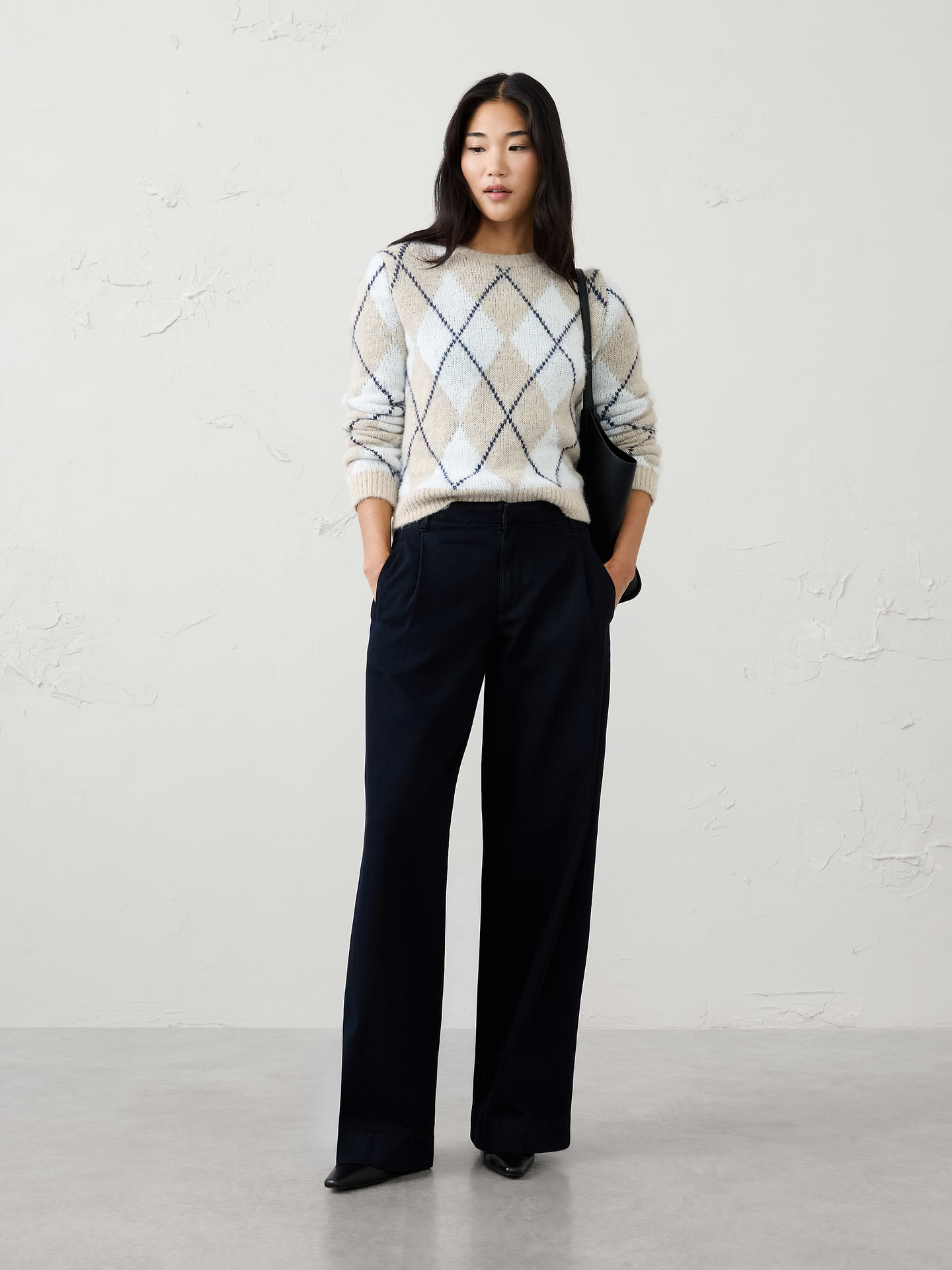 Image 1 of 3, Elevate your denim collection with this wide-leg mid-rise denim trouser, designed to bring a polished feel to seasonal dressing. Crafted in a refined denim fabrication, this sophisticated silhouette features a flattering mid-rise waist, soft front pleats, and a full-length wide leg for effortless movement and modern appeal. Pair it with a sweater, blazer, or statement top for a look that transitions seamlessly from day to night., Classic fit. Mid rise. Wide leg. Full length., Hook-and-bar closure with zip fly. Belt loops., Front pleat detailing., Vertical welt front pockets., Back welt pockets., Back waist darts., Made exclusively for Banana Republic Factory., Product #1181445