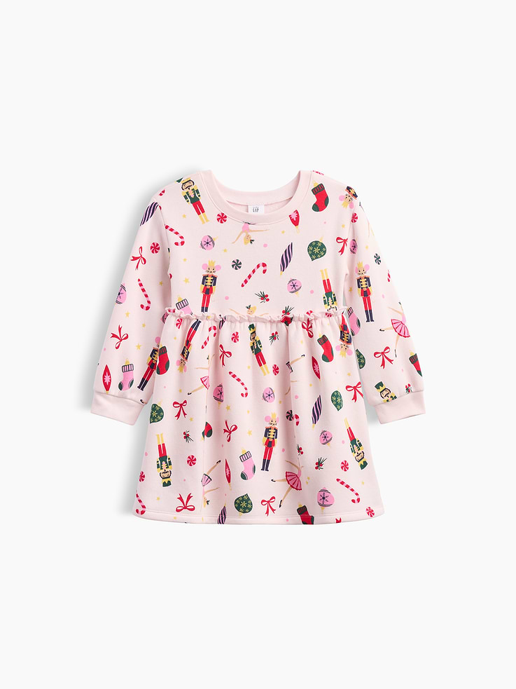Image 1 of 3, Soft, comfy fleece., Long sleeves with banded cuffs., Crewneck., Ruffle trim and shirring at waist., Select styles have allover print., Product #1184593