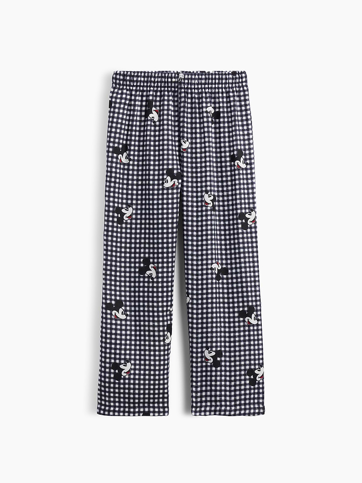 Image 1 of 3, A very special collaboration between Gap and Disney— two timeless, iconic American brands— led us to create a collection that celebrates Mickey Mouse and Minnie Mouse., Smooth flannel sleep pants., Elasticized waist., Allover Mickey Mouse gingham print., Shop matching PJs for all., This product was made in a factory that invests in gender equity and women’s empowerment through RISE. Learn more at, Product #1185530