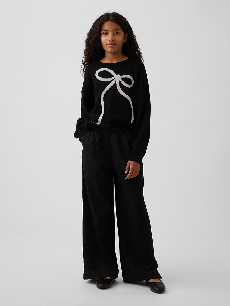 Image 1 de 5, Mélange de rayonne lisse et extensible., Taille élastique à cordon de serrage., Poches cavalières sur les côtés., Fait de polyester recyclé à 64 %. Comparativement aux matières vierges, l’utilisation de matières recyclées permet de réduire l’utilisation des ressources et le gaspillage., Produit #1181426