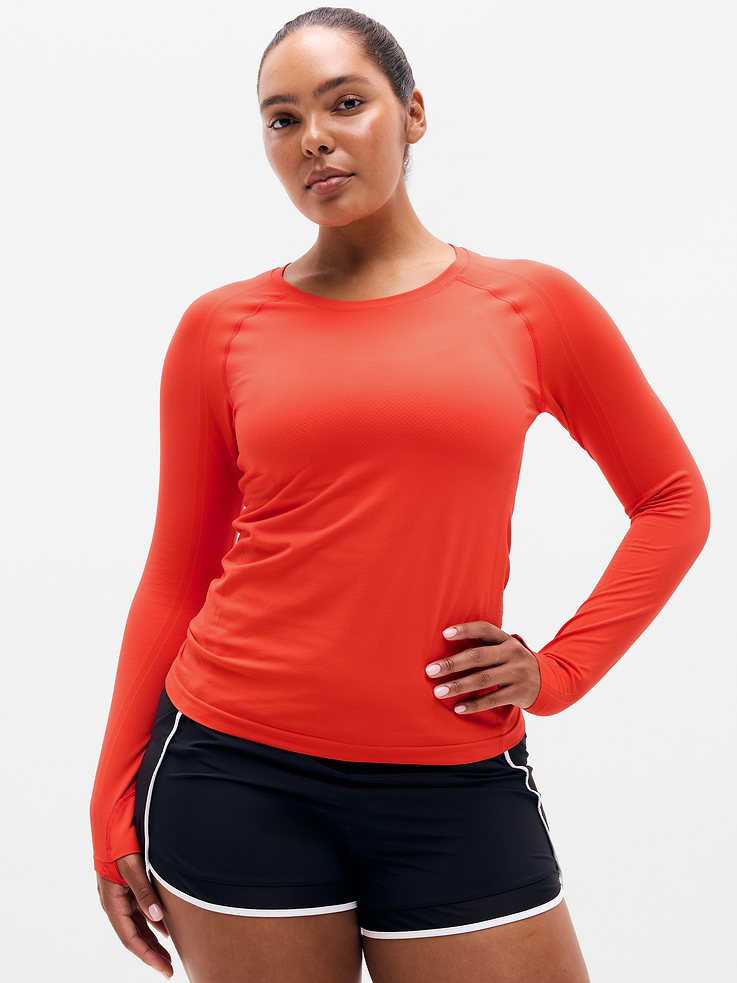 Image 1 of 6, FOR: Medium to high-impact workouts at the gym, studio, or outdoors, FEEL: Enhanced yarns deliver soft stretch and quick recovery, keeping you comfortable while you push your limits, FAVE: The workout top you love, now with upgraded stretch, sweat-wicking power, and sleek style, Seamless construction for minimal chafing, Functional mesh panels allow for optimal movement and breathability, Thumbholes lock your fit in place, Grippers at inner hem prevent it riding up, Product #845688