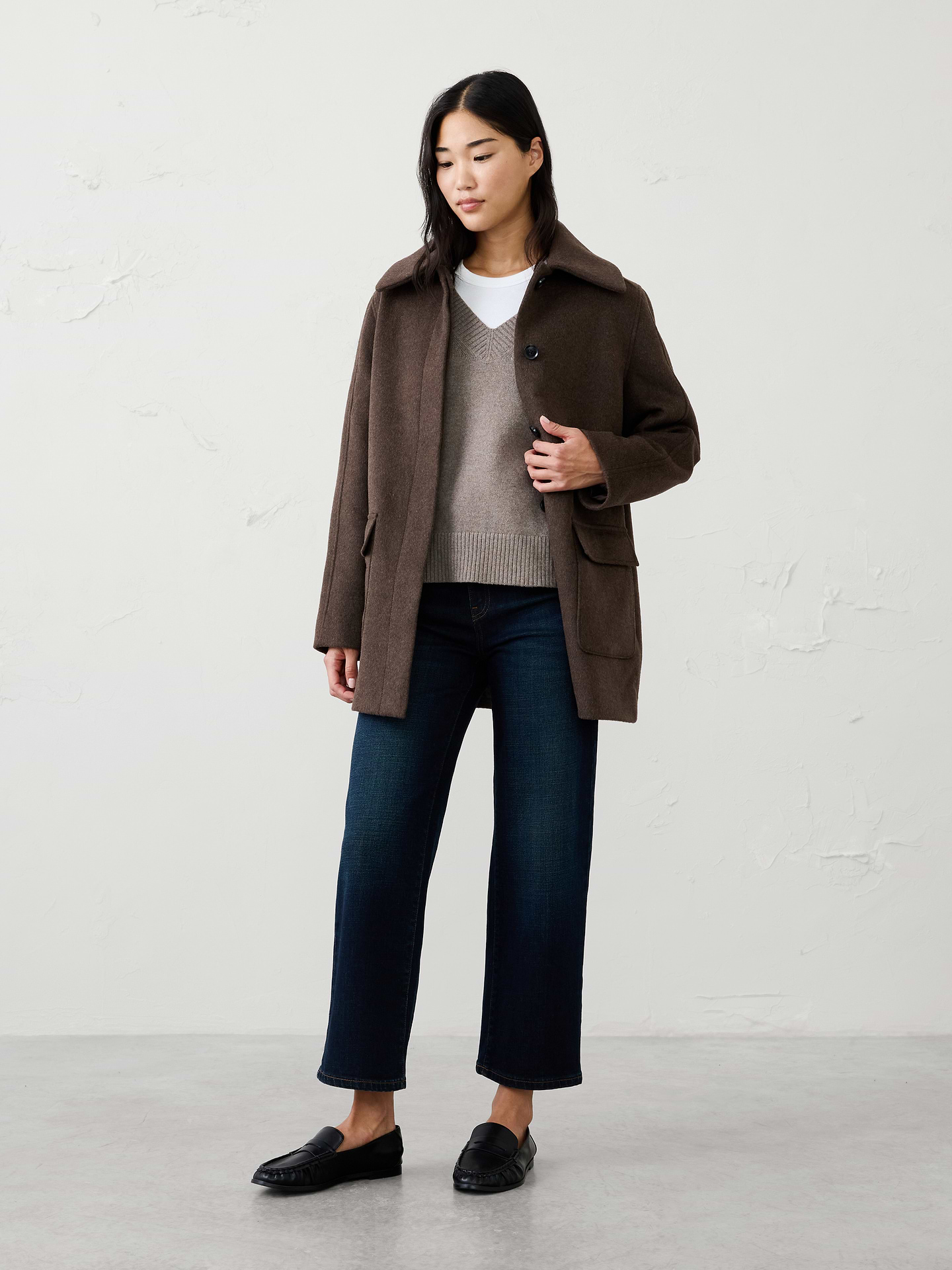 Image 1 of 4, Our overcoat offers a clean, tailored look with a relaxed fit through the body. Warm, sophisticated, and endlessly versatile, it's an easy way to dress up any outfit while staying comfortable in colder temperatures., Pointed collar. Long sleeves., Drop shoulders., Hidden button‑front closure., Large flap patch front pockets., Fully lined., Made exclusively for Banana Republic Factory., Product #1178064