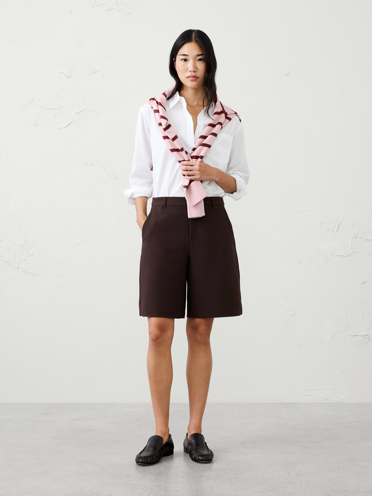 Image 1 of 7, Meet your new go-to short for polished, versatile styling. This high-rise Bermuda short is crafted from a substantial bi-stretch fabric that offers the perfect balance of structure, comfort, and flexibility. Whether paired with a blazer and heels or styled with a tee and sneakers, this customer-favorite short is an easy wardrobe essential for warm-weather dressing., Front button and zip-fly closure., Front pleat detailing., Off-seam front pockets. Back welt pockets., Made exclusively for Banana Republic Factory., Product #1182231