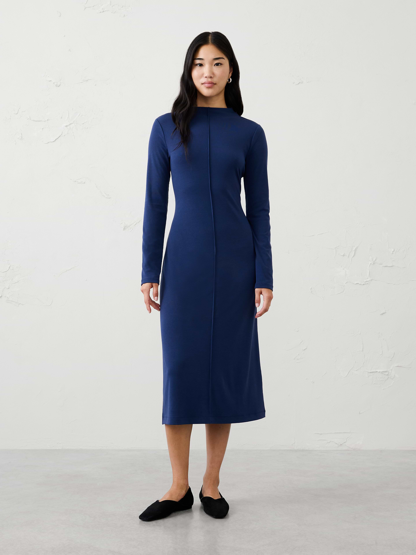Image 1 of 7, SUSTAINABILITY: Made with 60% recycled polyester., Mock neck. Slightly longer sleeves., Features center front pintuck detailing., Fitted at waist., Straight hem., Made exclusively for Banana Republic Factory., Product #1181238