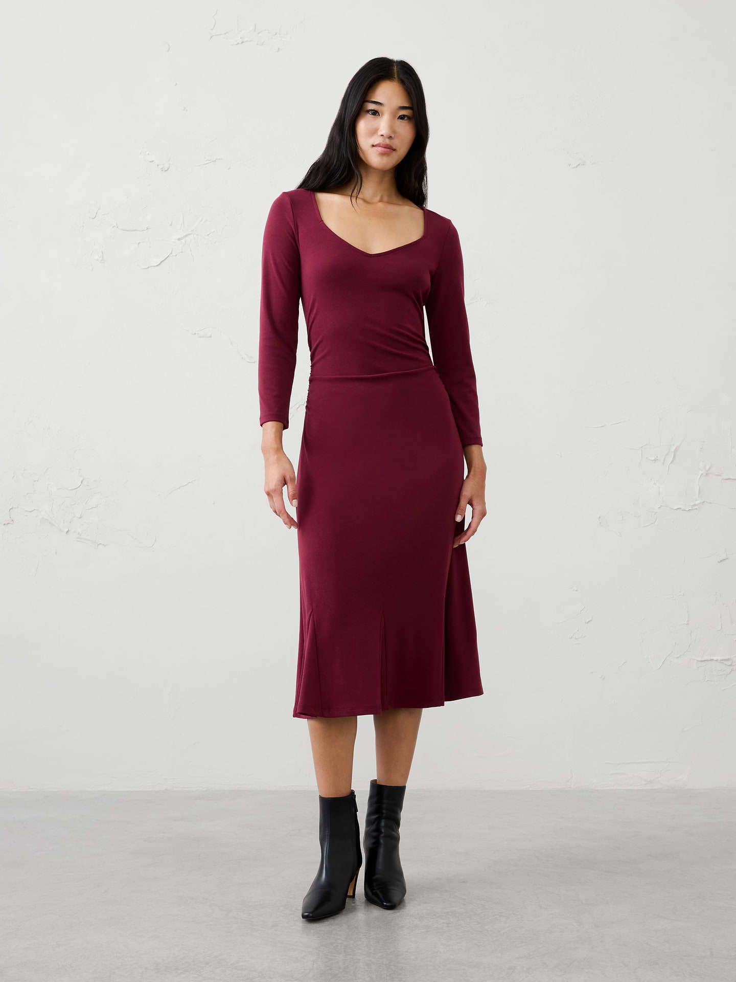 Image 1 of 3, Our customer‑favorite Cozy Rib fabric returns in a flattering sweetheart neckline, enhanced with shirred detailing that creates soft texture and shape. Designed for all‑day comfort and effortless style, it's an easy, feminine dress you'll reach for again and again., SUSTAINABILITY: Made with 60% recycled polyester., Sweetheart neckline. Long sleeves., Shirred detailing at the waist creates flattering shape and dimension., Godet panel inserts add volume and movement through the lower skirt., Flared hem creates a graceful fit‑and‑flare silhouette., Made exclusively for Banana Republic Factory., Product #1185692
