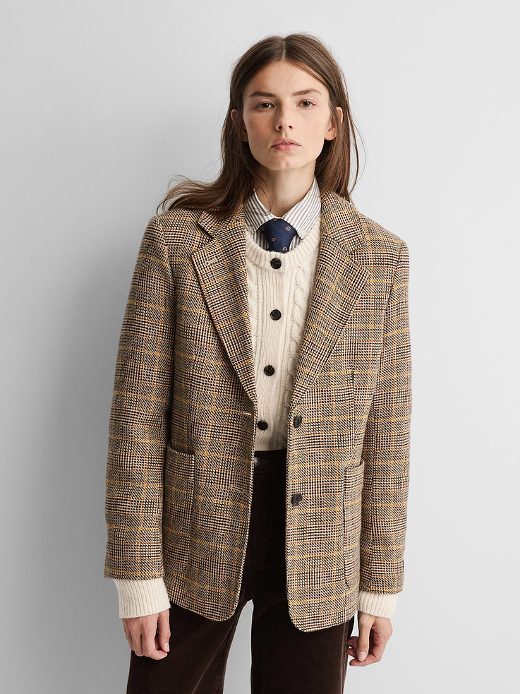 Image 1 of 9, Soft wool-blend twill blazer. In a relaxed, tailored fit., Notch collar., Long sleeves with button cuffs., Gap × A.P.C. logo patch at cuff., Vegan suede elbow patches., Button front., Patch pockets at front., Allover plaid., Product #1179762