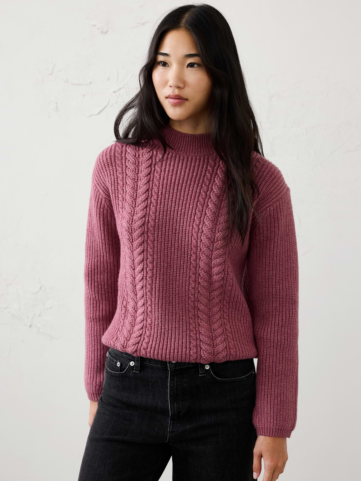 Image 1 of 4, Our sweater is knit from our signature Perfectly Soft yarn—a luxurious blend of cotton with a hint of wool, that feels as cozy as it looks. Classic cable stitching adds timeless texture and dimension, elevating the silhouette with a heritage‑inspired touch., Mock neck. Long sleeves., Drop shoulders., Made exclusively for Banana Republic Factory., Product #1177060