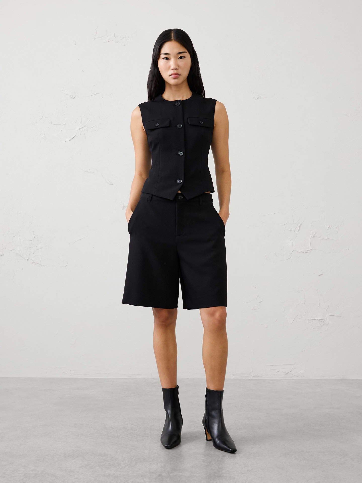 Image 1 of 7, Meet your new go-to short for polished, versatile styling. This high-rise Bermuda short is crafted from a substantial bi-stretch fabric that offers the perfect balance of structure, comfort, and flexibility. Whether paired with a blazer and heels or styled with a tee and sneakers, this customer-favorite short is an easy wardrobe essential for warm-weather dressing., Front button and zip-fly closure., Front pleat detailing., Off-seam front pockets. Back welt pockets., Made exclusively for Banana Republic Factory., Product #1182231