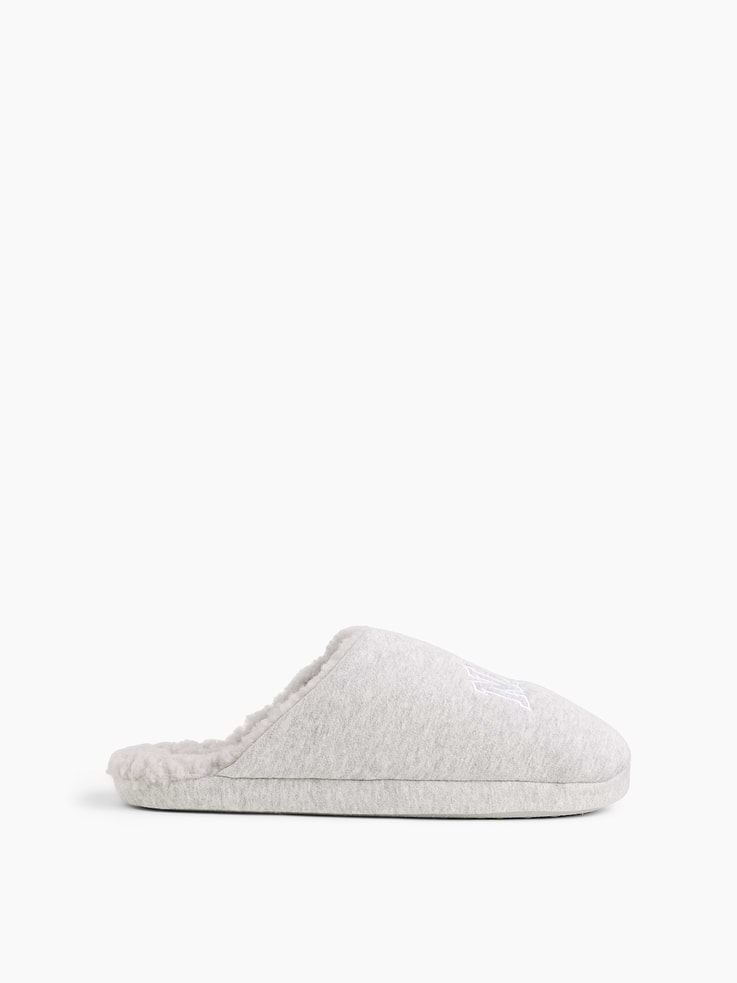 Image 1 of 4, These slippers are made with a soft fleece upper with a cozy sherpa lining., Soft sole., NAP logo at front., Product #1189118