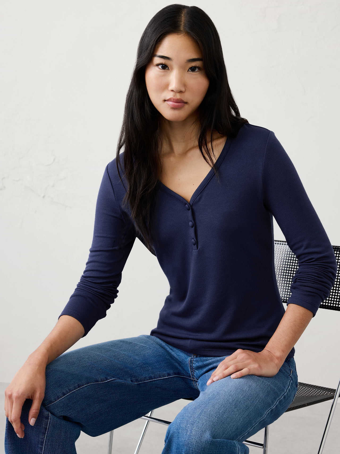 Image 1 of 4, A customer favorite, our Soft Luxe knit returns as a cozy yet lightweight alternative to a traditional sweater. It offers versatile comfort that layers beautifully and transitions effortlessly through the season., Henley vee neckline. Long sleeves., Three button placket., Made exclusively for Banana Republic Factory., Product #1185999