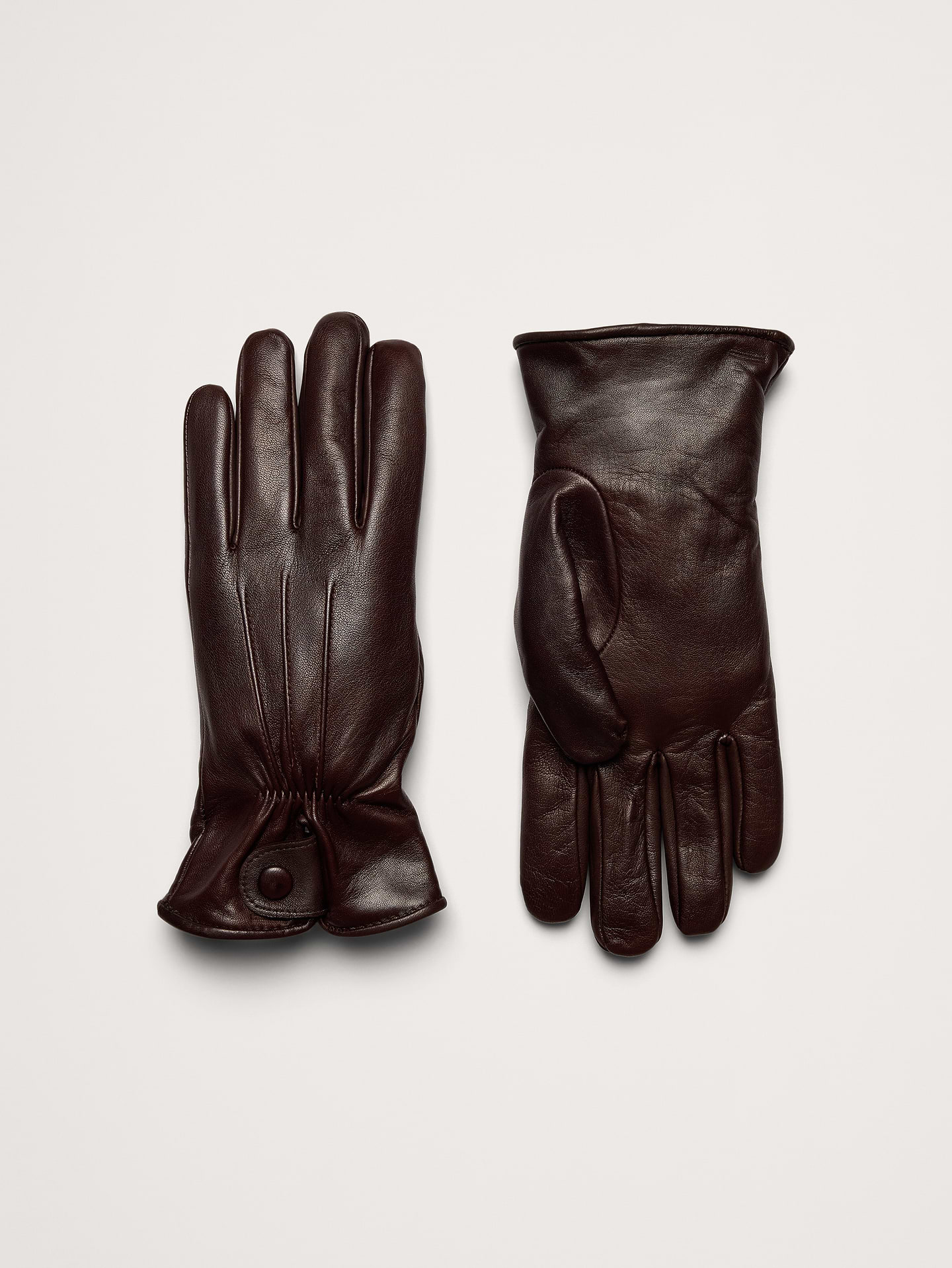 Image 1 of 1, You wont find another pair quite like this. Crafted in Italy from beautiful leather, we added beautiful pintuck detailing to the wrists and lined these timeless dress gloves with soft cashmere for added luxury., Fabric from Italy's Gianni Collini Srl., Product #906930
