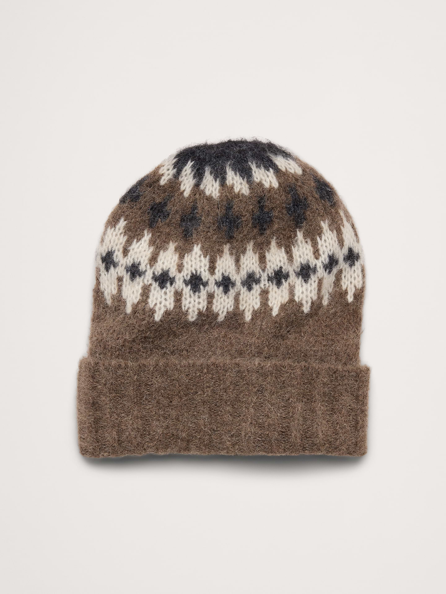 Image 1 of 2, This chunky beanie uses traditional Fair Isle motifs, a soft alpaca-blend construction, and a foldover cuff to keep you extra cozy., Fabric from Italy's Millefili mill., Product #915474