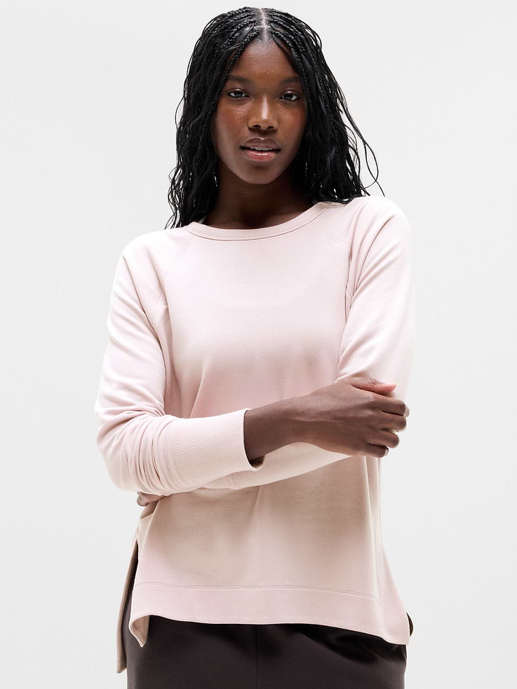 Image 1 of 6, Your favorite CYA sweatshirt, now with revamped finishes, stay-closed thumbholes, and a crew neckline, FOR: Lounge and restoration, FEEL: Super-soft Brushed Nirvana is extra cozy, Thumbholes hold sleeves in place and keep you warm, Slits on side for easier mobility, Product #659287