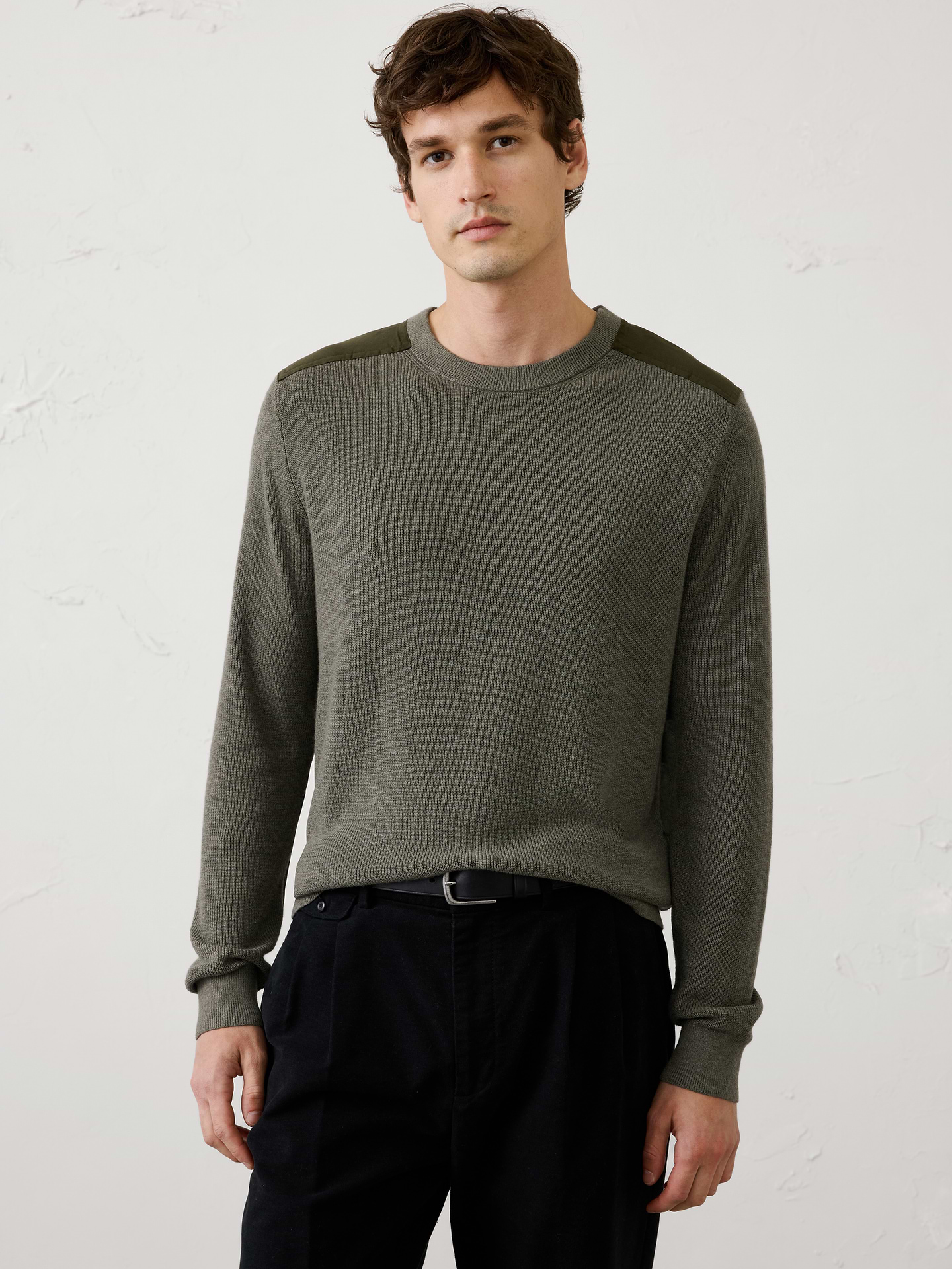 Image 1 of 3, This crewneck sweater features an allover ribbed stitch that adds rich texture and dimension to a classic silhouette. A tonal vegan suede patch at the shoulder provides a subtle contrast and elevated detail, making this an easy standout piece., Crew neck. Long sleeves., Ribbed neck, arm cuffs and hem., Made exclusively for Banana Republic Factory., Product #1175521