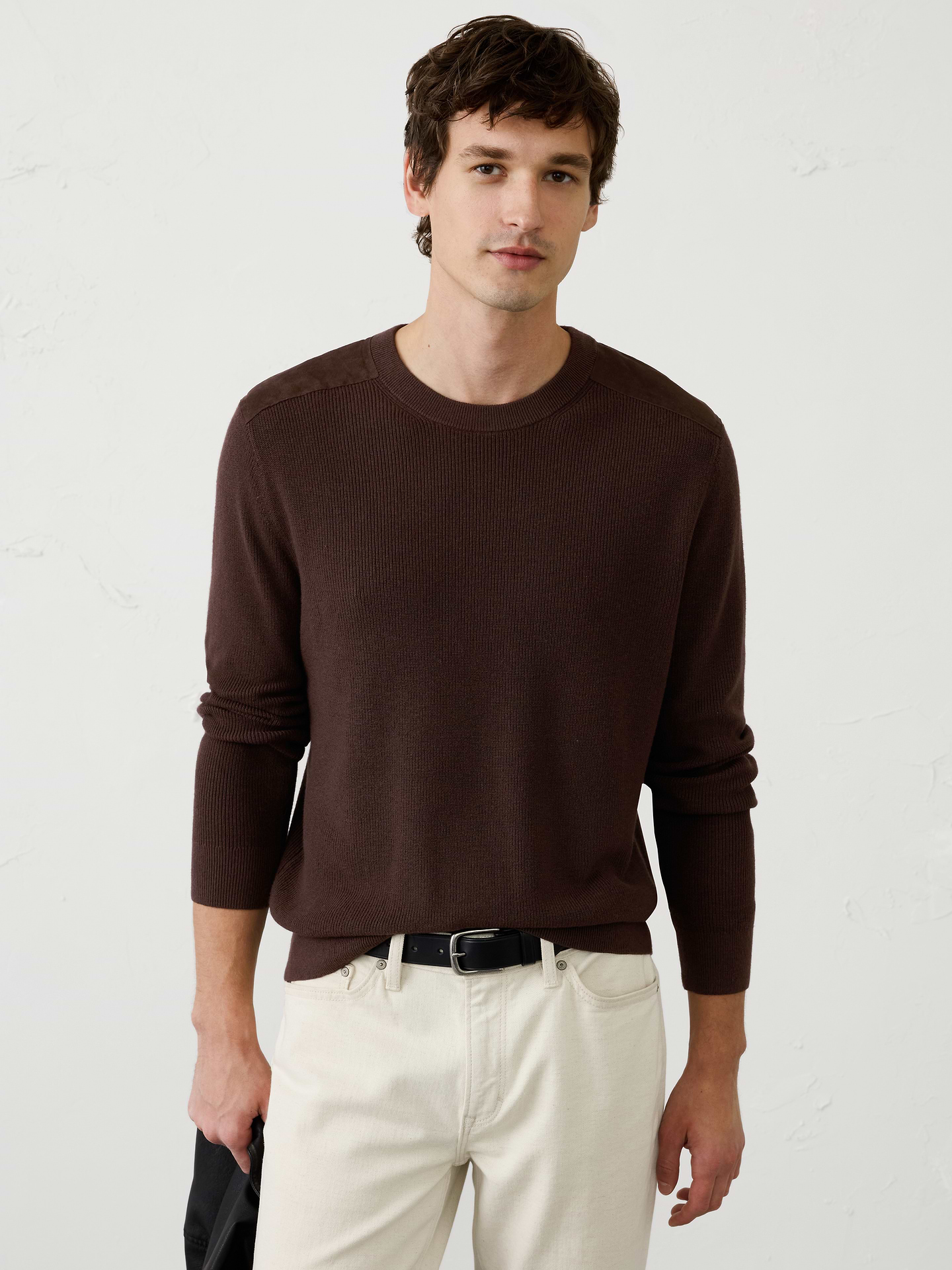 Image 1 of 3, This crewneck sweater features an allover ribbed stitch that adds rich texture and dimension to a classic silhouette. A tonal vegan suede patch at the shoulder provides a subtle contrast and elevated detail, making this an easy standout piece., Crew neck. Long sleeves., Ribbed neck, arm cuffs and hem., Made exclusively for Banana Republic Factory., Product #1175521