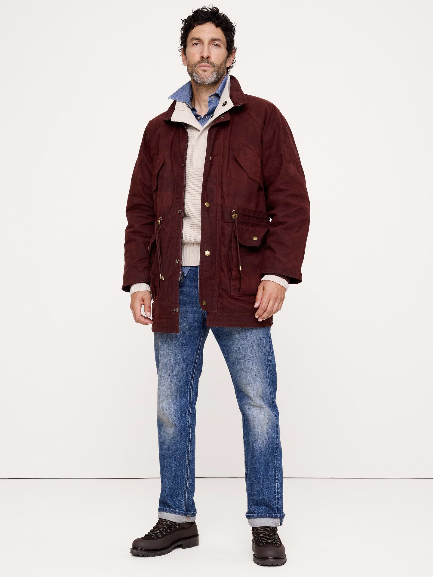 Image 1 of 8, A nod to our archives, this cotton canvas parka is cut from a rugged fabric and finished with a waxed coating built to brave the elements., Relaxed Fit: A straight & roomy fit with a dropped shoulder seam., Product #906598