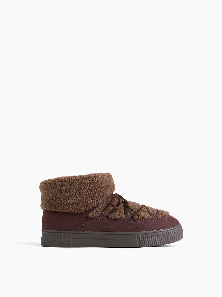Image 1 of 5, These snow boots are made with a soft sherpa and vegan suede upper., Lace-up styling., Rubber gripper sole., Note: Light brown boots have GAP logo charms at side., Product #1185930