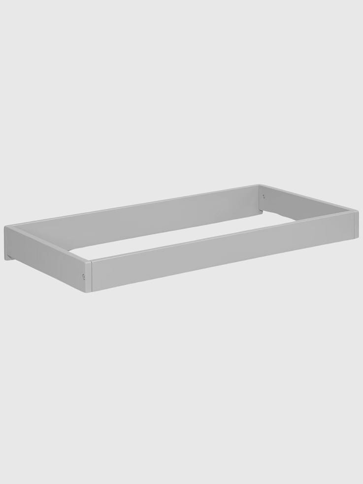 Image 1 of 3, Simplify changing time and effortlessly transform any babyGap dresser with the babyGap Changing Top!, Make diaper duty doable with its secure and sturdy design., Easy to install and remove, it features felt on the bottom to protect your dresser., When you no longer need a changing area, the topper is quick and easy to remove!, Pair with the Legacy 3 Drawer Dresser, Legacy 6 Drawer Dresser or any dresser with a top at least 33.75"W x 17.25"D., This product is Greenguard Gold certified to meet stringent chemical emissions standards., JPMA certified to meet or exceed all safety standards set by the CPSC & ASTM.