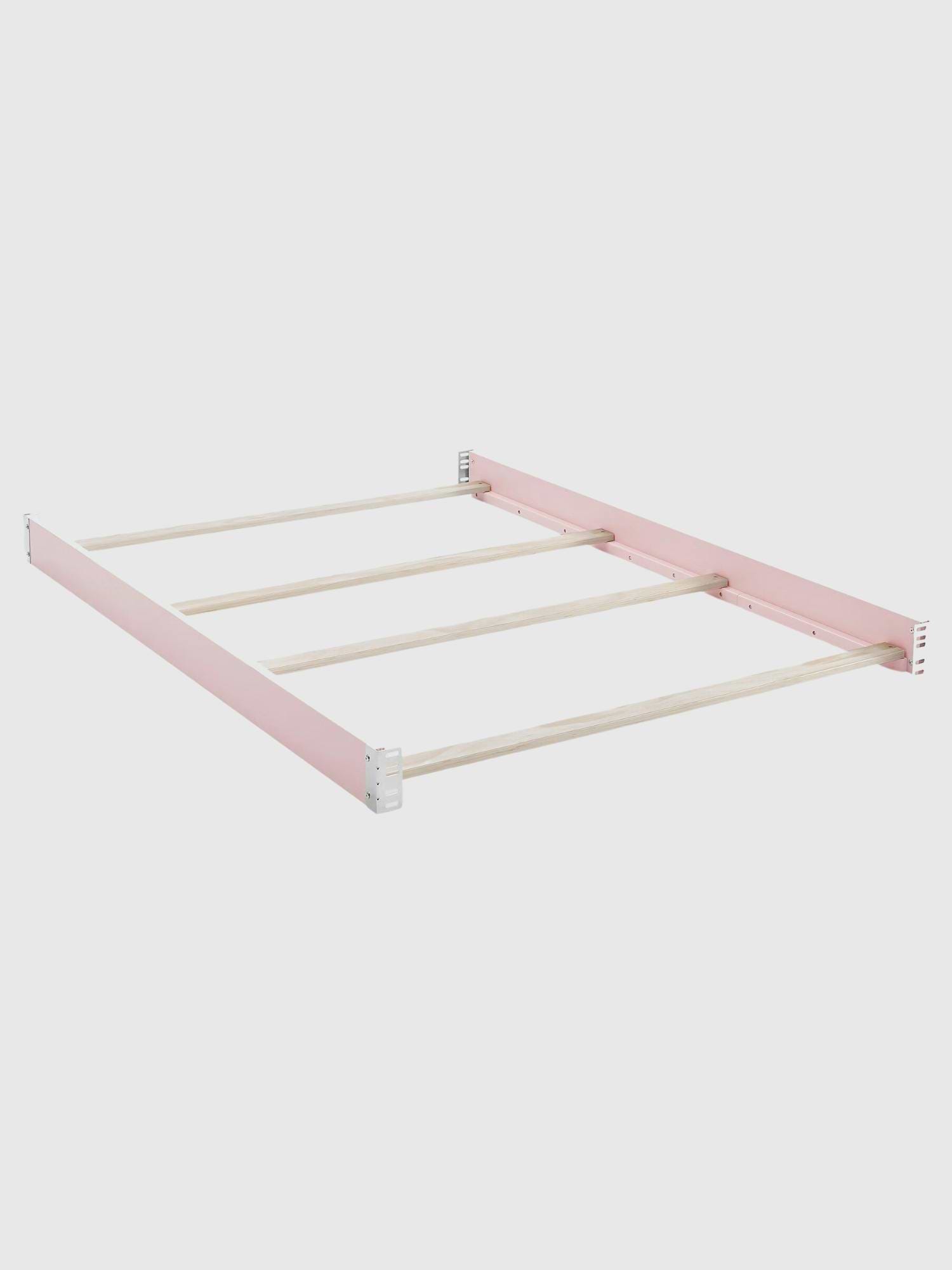 Image 1 of 4, Extend the life of your crib with the babyGap Full Size Bed Rails., Designed to easily convert your crib into a full size bed, the wooden rails replace the sides of the crib., The rails feature bolt-on assembly for attaching a headboard and footboard., Compatible with the Charlie and Oxford babyGap cribs., Accommodates a full size mattress; mattress foundation required (Mattress and Foundation Sold Separately).
