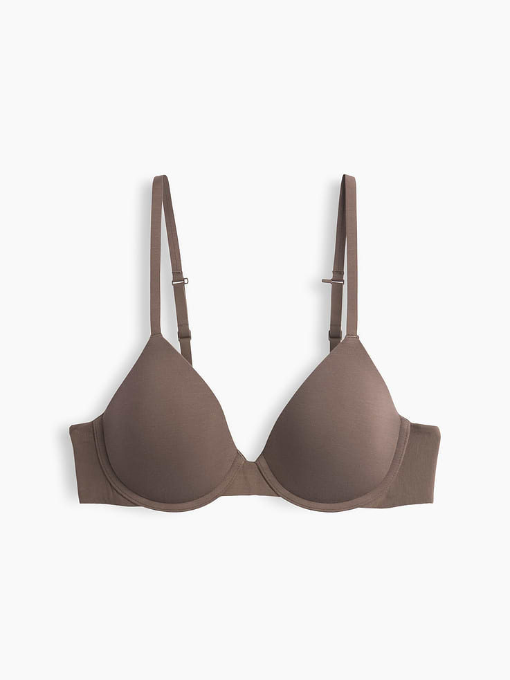 Image 1 of 3, A foundation of comfort — made exceptionally soft., Soft, lightweight stretch modal T-shirt bra., V-neck., Adjustable spaghetti straps., Adjustable hook-and-eye back closures at back., Shop more SoftMade Modal ., Product #909166