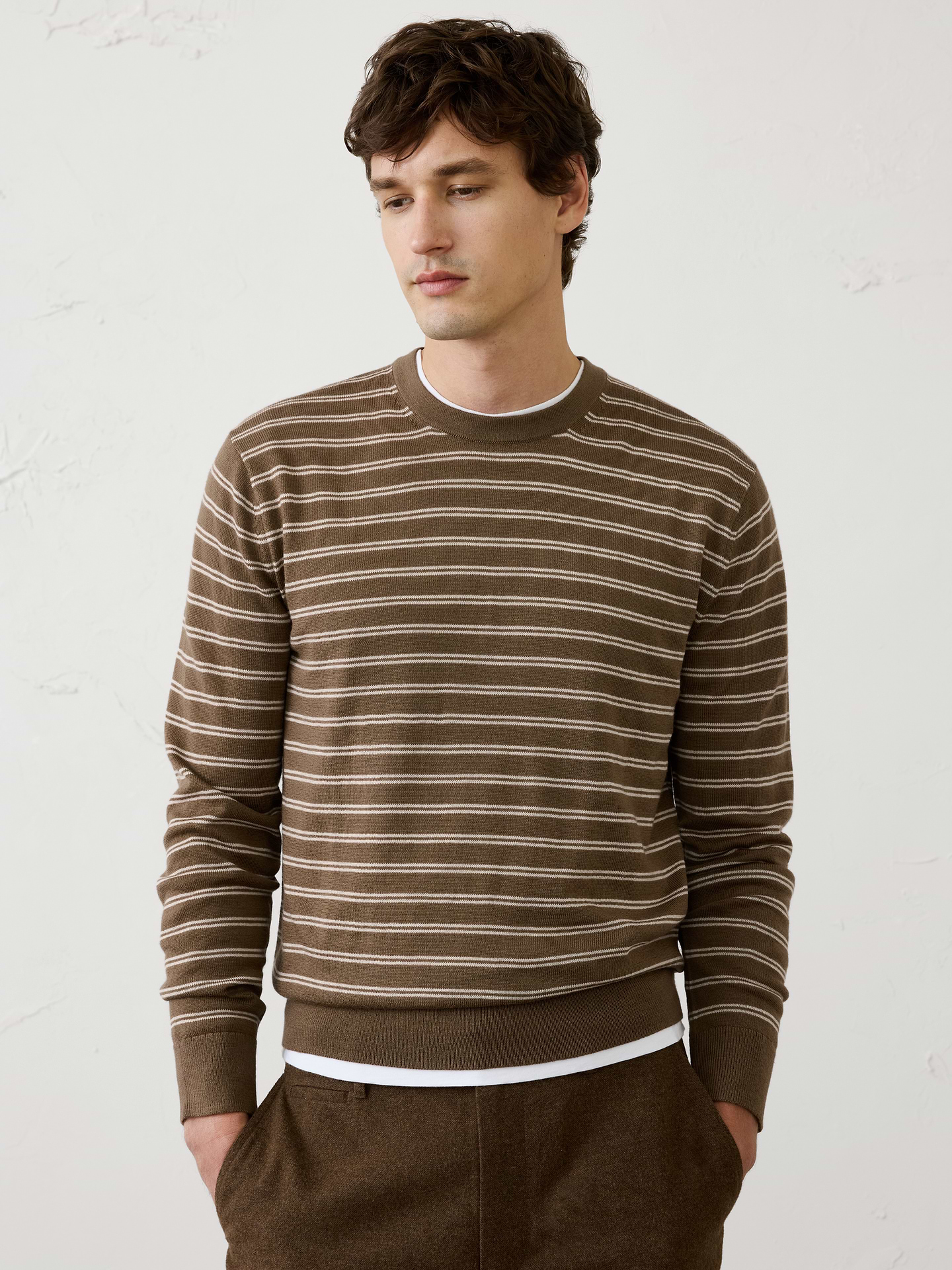 Image 1 of 8, Our classic Merino wool sweater is the definition of timeless versatility. Crafted from luxuriously soft Merino wool, it offers lightweight warmth, natural breathability, and a refined finish. Designed to be worn year‑round, it layers effortlessly and delivers polished style for any occasion., Crew neck. Long sleeves., Ribbed neckline, arm cuffs and hem., Made exclusively for Banana Republic Factory., Product #1175809