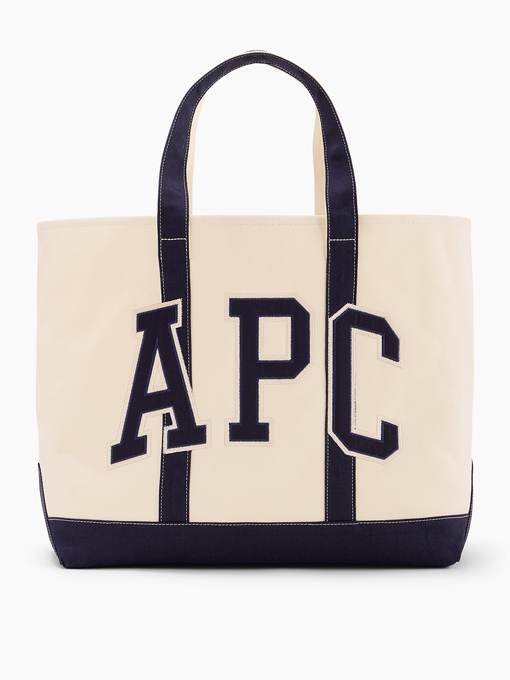 Image 1 of 4, Sturdy cotton canvas tote bag., Handles at top., A.P.C. arch logo, Gap patch logo., Pocket at front., Product #1179737