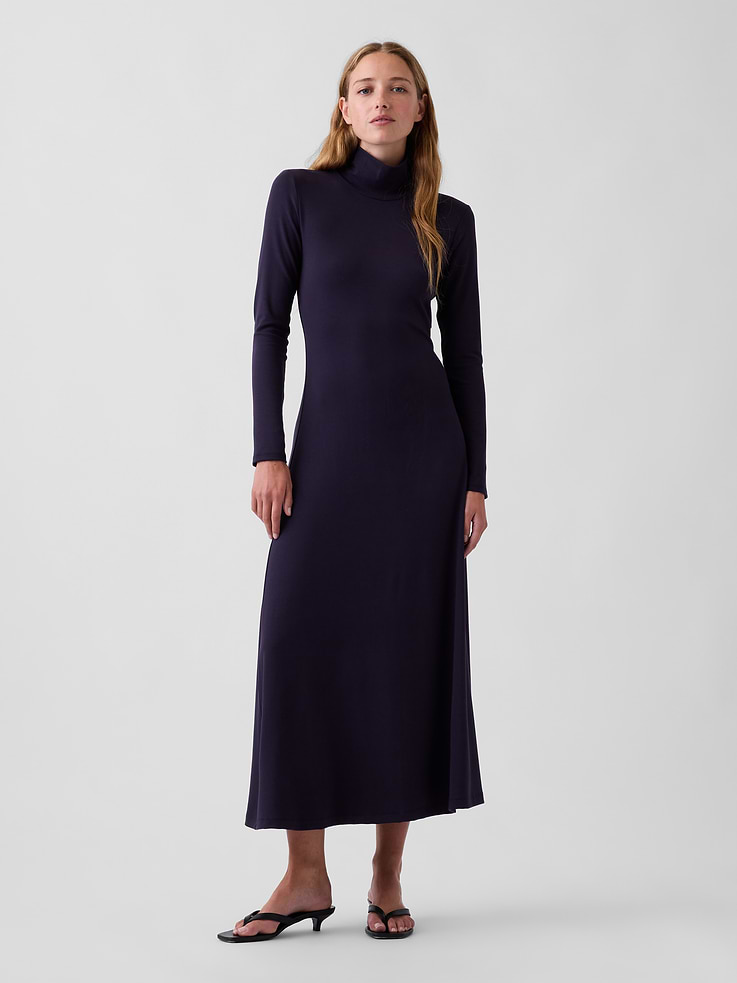 Image 1 of 5, Soft, stretch rayon knit maxi dress., Mockneck., Long sleeves., Vertical back seam., This product was made in a factory that invests in gender equity and women’s empowerment through RISE. Learn more at gapinc.com/equity ., Product #1185331