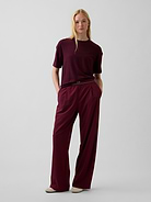 Image 1 de 6, Tricot extensible respirant à séchage rapide, taille extensible. Coupe ample., Tissu anti-moiteur qui garde la peau au sec., Bande élastique avec logo Gap sur le devant., Devant plissé., Poches latérales dans la couture., Fait de polyester recyclé à 86 %. Comparativement aux matières vierges, l’utilisation de matières recyclées permet de réduire l’utilisation des ressources et le gaspillage., Produit #908569