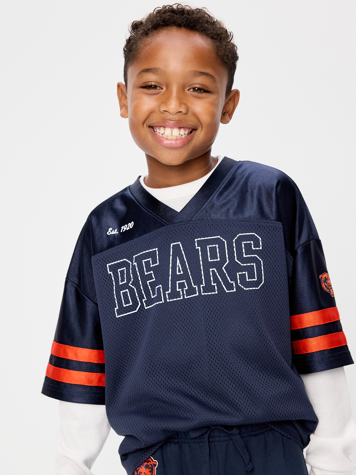 Image 1 of 5, A gender-neutral style for all-day play., v neck, short sleeves, drop shoulders, graphic at front, Product #916644
