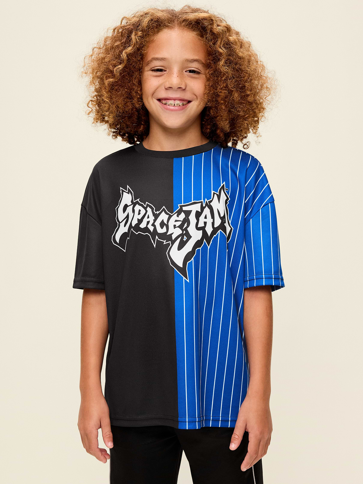 Image 1 of 2, crew neck, short sleeves, drop shoulders, licensed graphic, TM & © 2026 Warner Bros. Entertainment Inc. All rights reserved., Product #906064