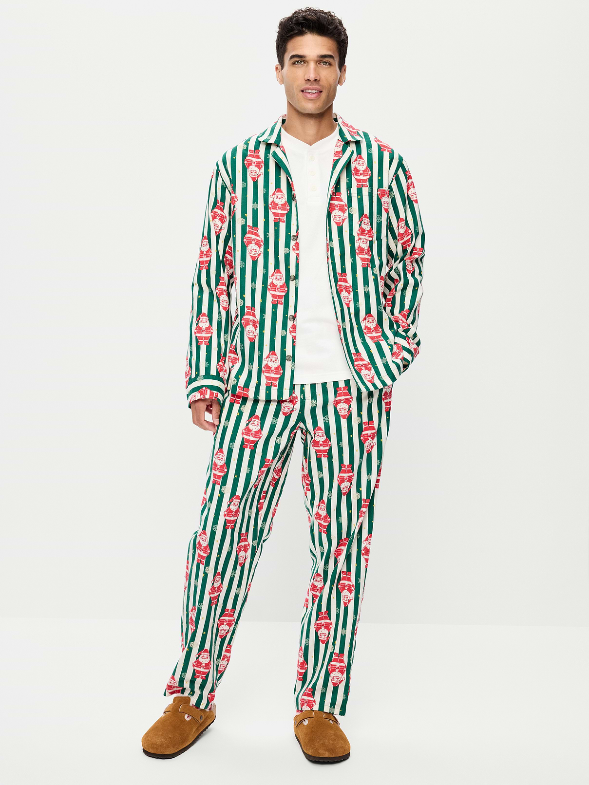 Image 1 of 3, set includes pajama shirt and matching pants, spread collar, long sleeves, button front, elastic-waist pajama pants, on-seam hip pockets, prints match back to the fam, Product #905023