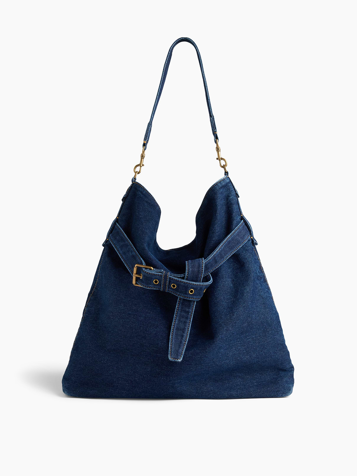 Image 1 of 7, Soft cotton denim shoulder bag., Removable shoulder strap., Magnetic snap closure., Belted detailing., Inner slip pocket., Laptop Friendly: up to 15"., Responsibly Made: This bag is part of our water-saving Washwell program. Compared with conventional wash methods, Washwell uses at least 20% less water., Explore our GapBag Collection ., Product #1181705