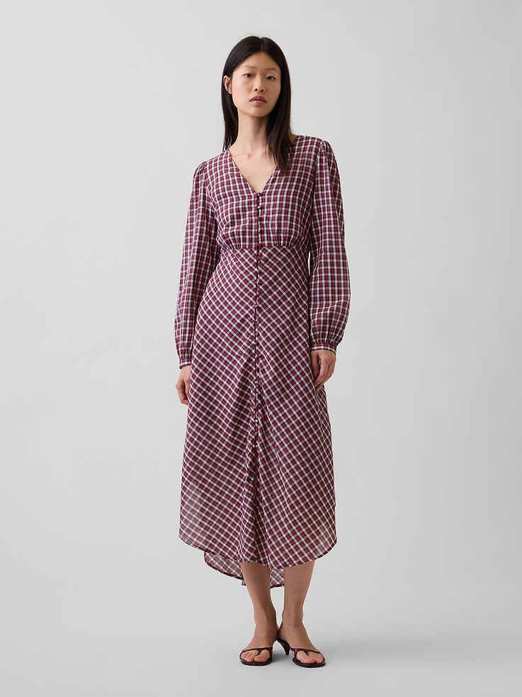 Image 1 of 5, Soft, airy cotton voile maxi dress with a detachable cami lining., V-neck, loop button front., Long puff sleeves with banded cuffs., Empire waist seam., High-low scoop hem., Allover plaid., Hidden snaps at shoulders to hold cami lining in place., This product was made in a factory that invests in gender equity and women’s empowerment through RISE. Learn more at gapinc.com/equity ., Product #1185332