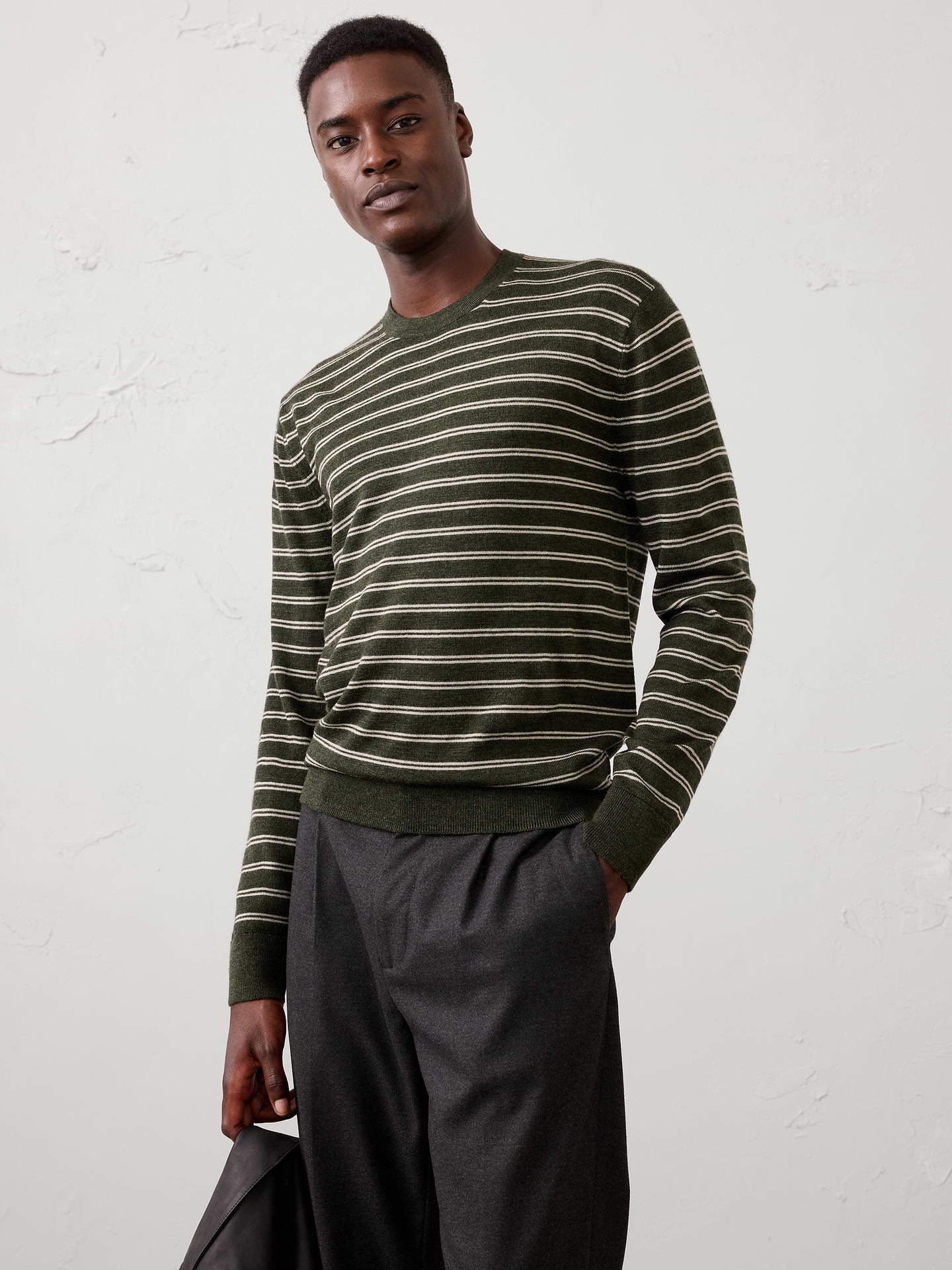 Image 1 of 8, Our classic Merino wool sweater is the definition of timeless versatility. Crafted from luxuriously soft Merino wool, it offers lightweight warmth, natural breathability, and a refined finish. Designed to be worn year‑round, it layers effortlessly and delivers polished style for any occasion., Crew neck. Long sleeves., Ribbed neckline, arm cuffs and hem., Made exclusively for Banana Republic Factory., Product #1175809
